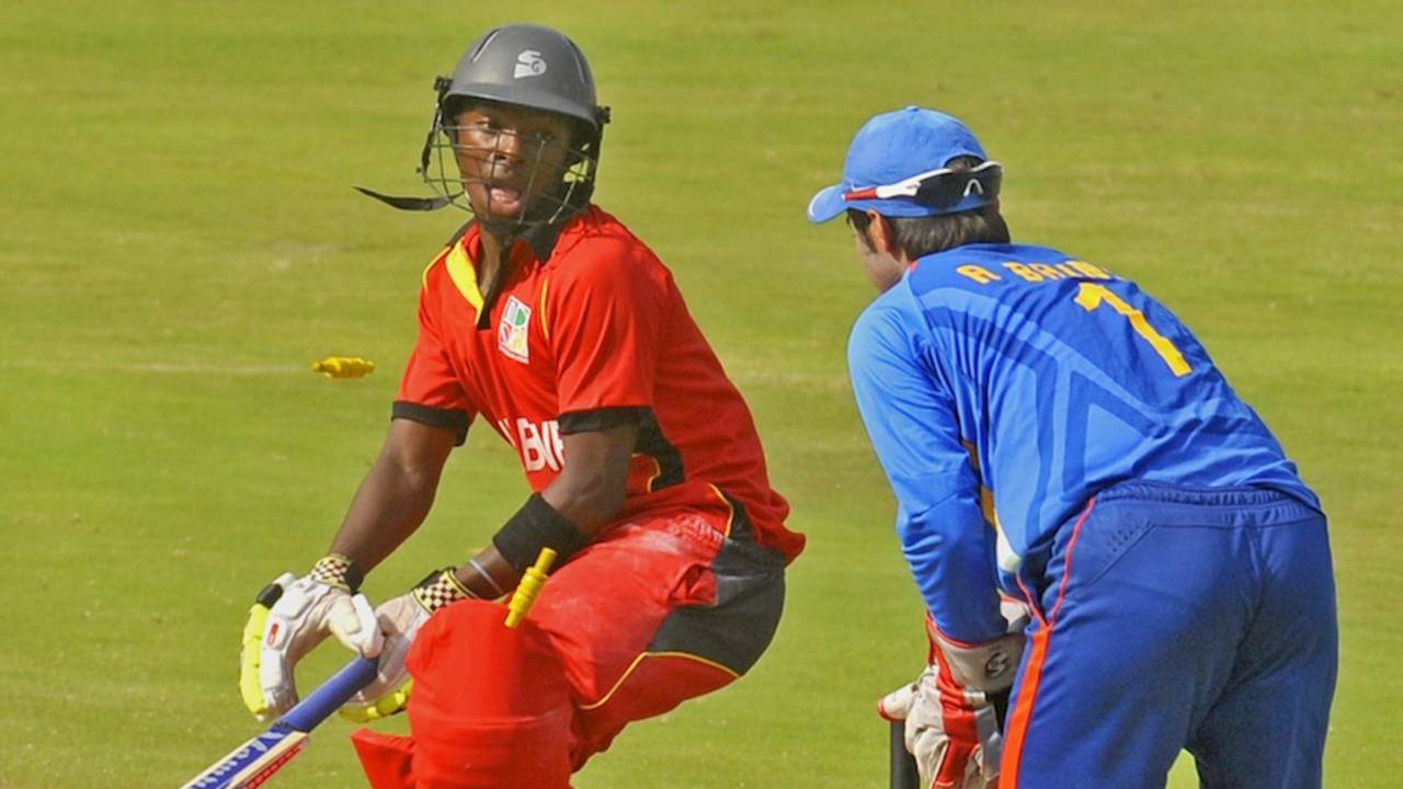 Shoun Handirisi is stumped by Ankush Bains, India Under-19s v Zimbabwe Under-19s, Visakhapatnam, Sep 23, 2013