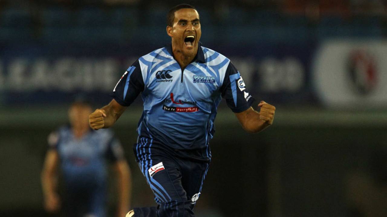 Rowan Richards exults after taking a wicket, Brisbane Heat v Titans, Group B, Champions League 2013, Mohali, September 24, 2013