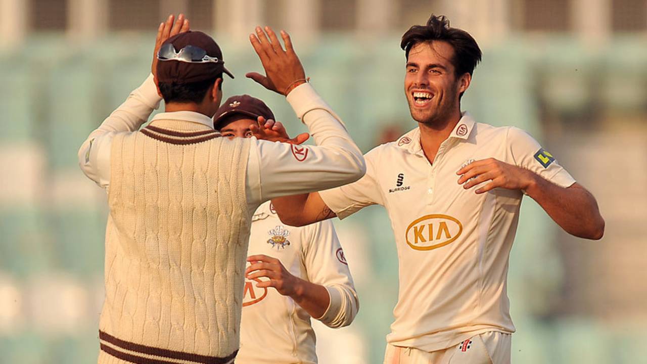 Tom Jewell celebrates a wicket in the autumn sunlight, Surrey v Yorkshire, County Championship, Division One, The Oval, September 24, 2013