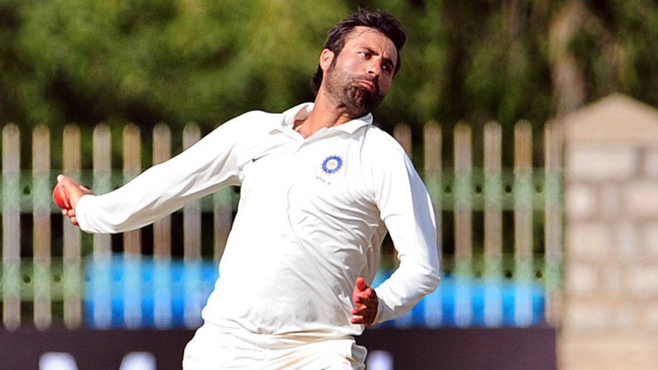 Parvez Rasool bowls for India A, India A v West Indies A, 1st unofficial Test, 1st day, Mysore, September 25, 2013