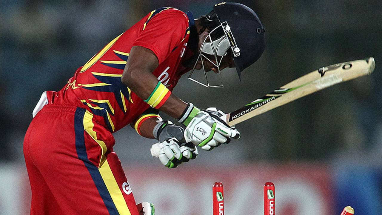 Thami Tsolekile loses his middle stump to James Faulkner, Lions v Rajasthan Royals, Group A, Champions League 2013, Jaipur, September 25, 2013