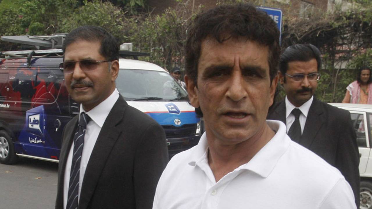 Asad Rauf leaves the press conference with his lawyer Syed Ali Zafar, Lahore, September 27, 2013