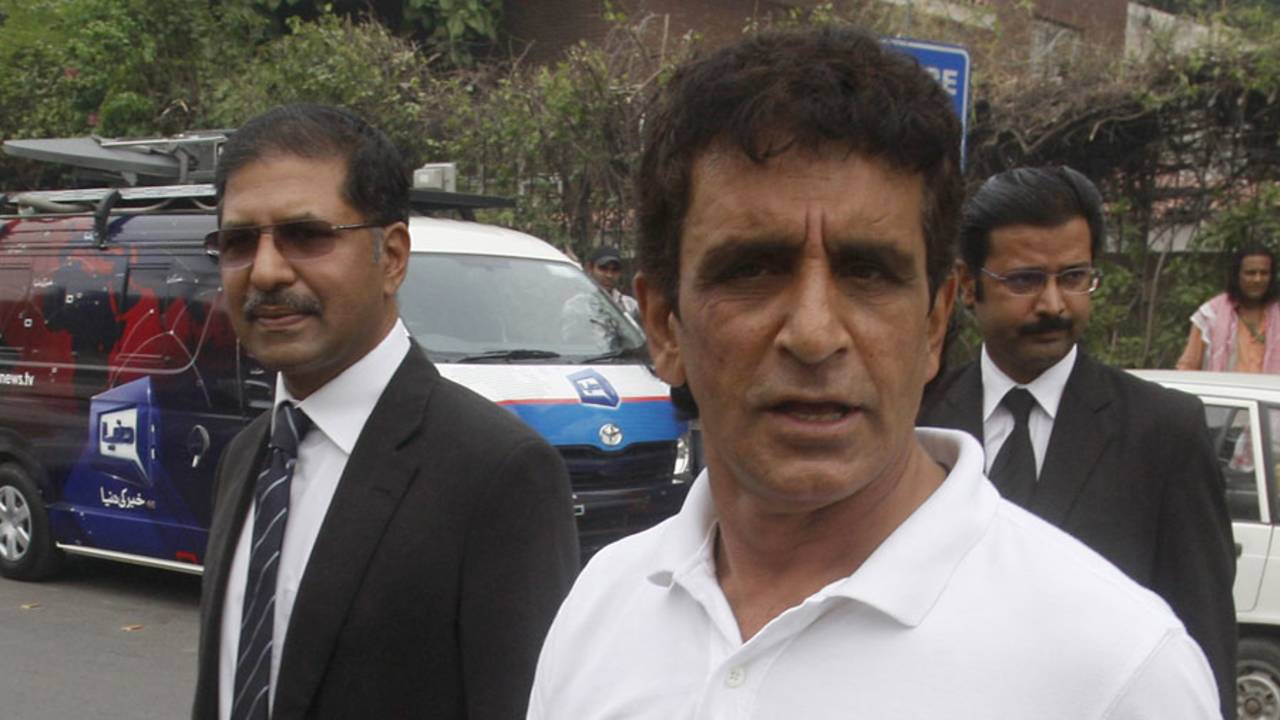 Asad Rauf leaves the press conference with his lawyer Syed Ali Zafar 