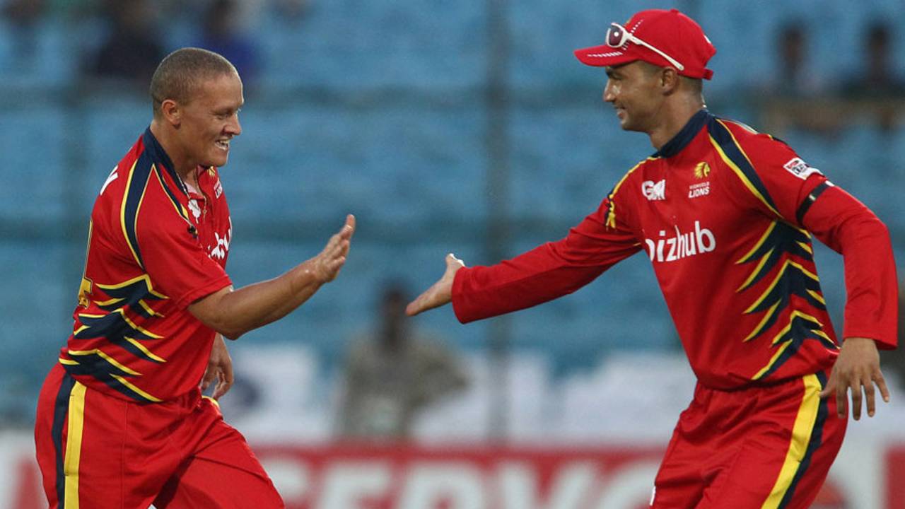 Ethan O'Reilly celebrates a wicket with Alviro Petersen, Lions v Otago, Group A, Champions League 2013, Jaipur, September 29, 2013