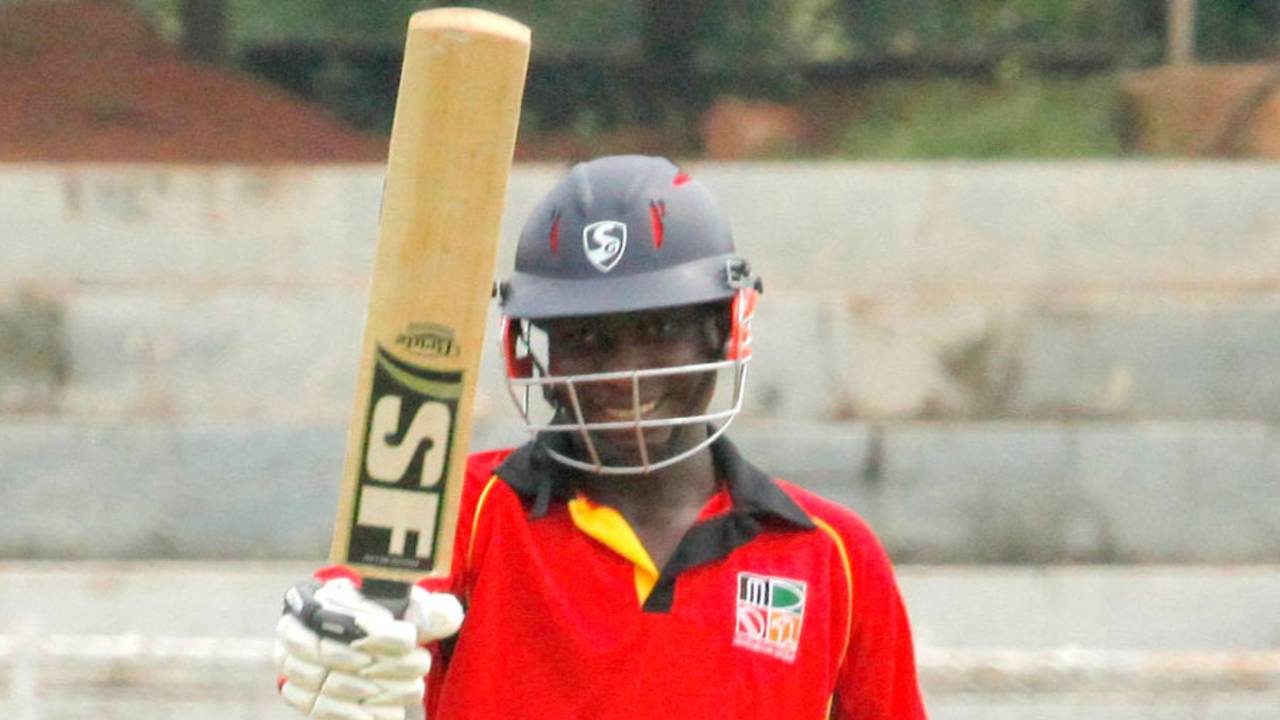 Clive Chitumba raises his bat after hitting fifty, India U-19s v Zimbabwe U-19s, Visakhapatnam, September 29, 2013