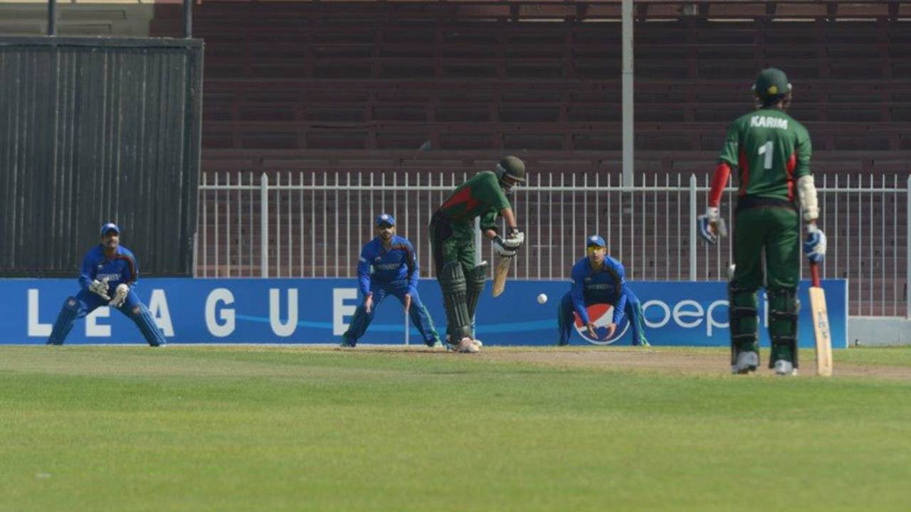 Fifteen-year-old Gurdeep Singh defends the ball, Afghanistan v Kenya, WCL Championship, Sharjah, October 4, 2013
