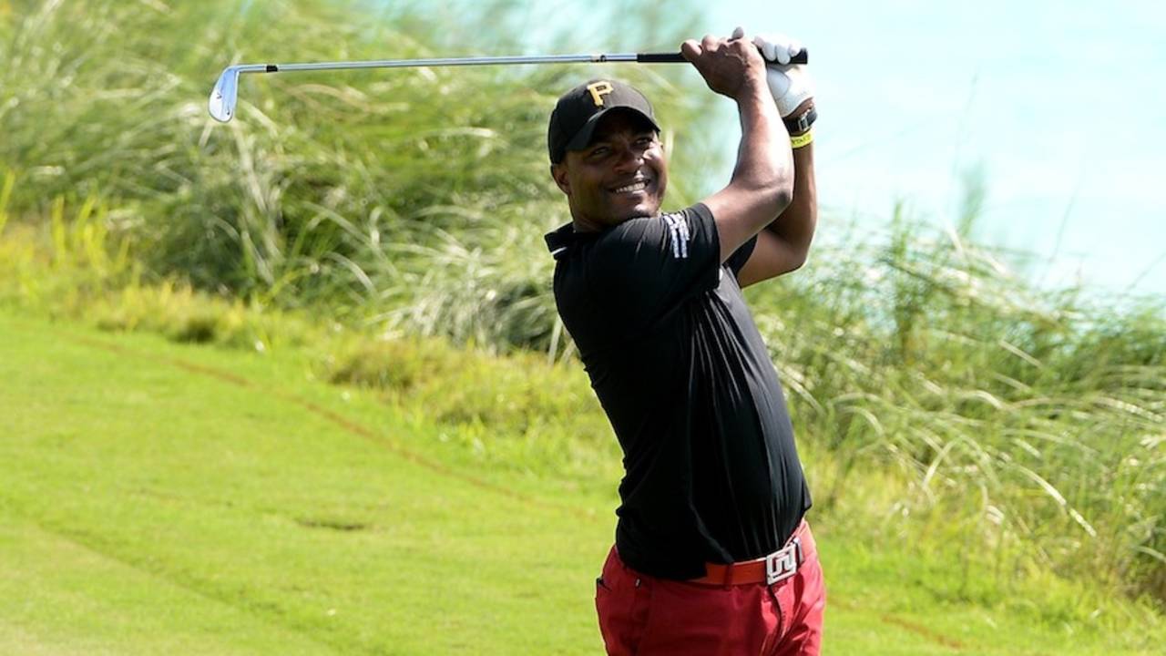 Brian Lara swings one over the top during a pro-am golf event, Bermuda, October 14, 2013