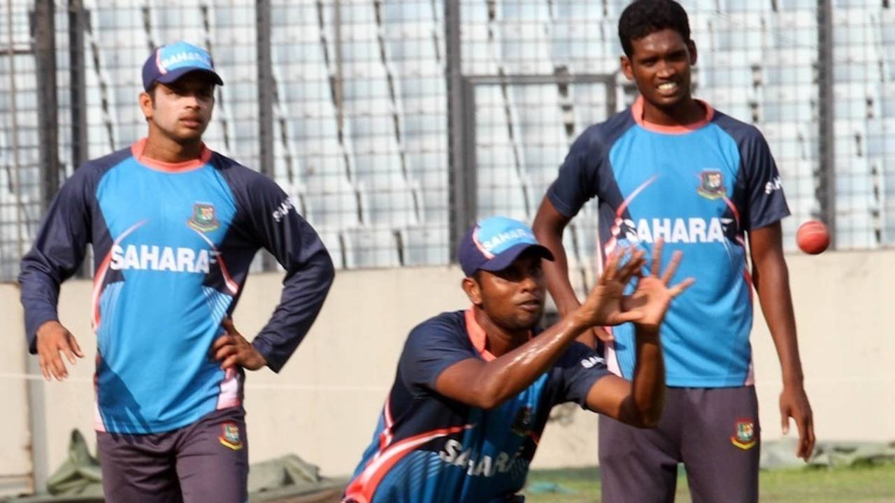 Sohag Gazi takes a catch during practice , Dhaka, October 18, 2013
