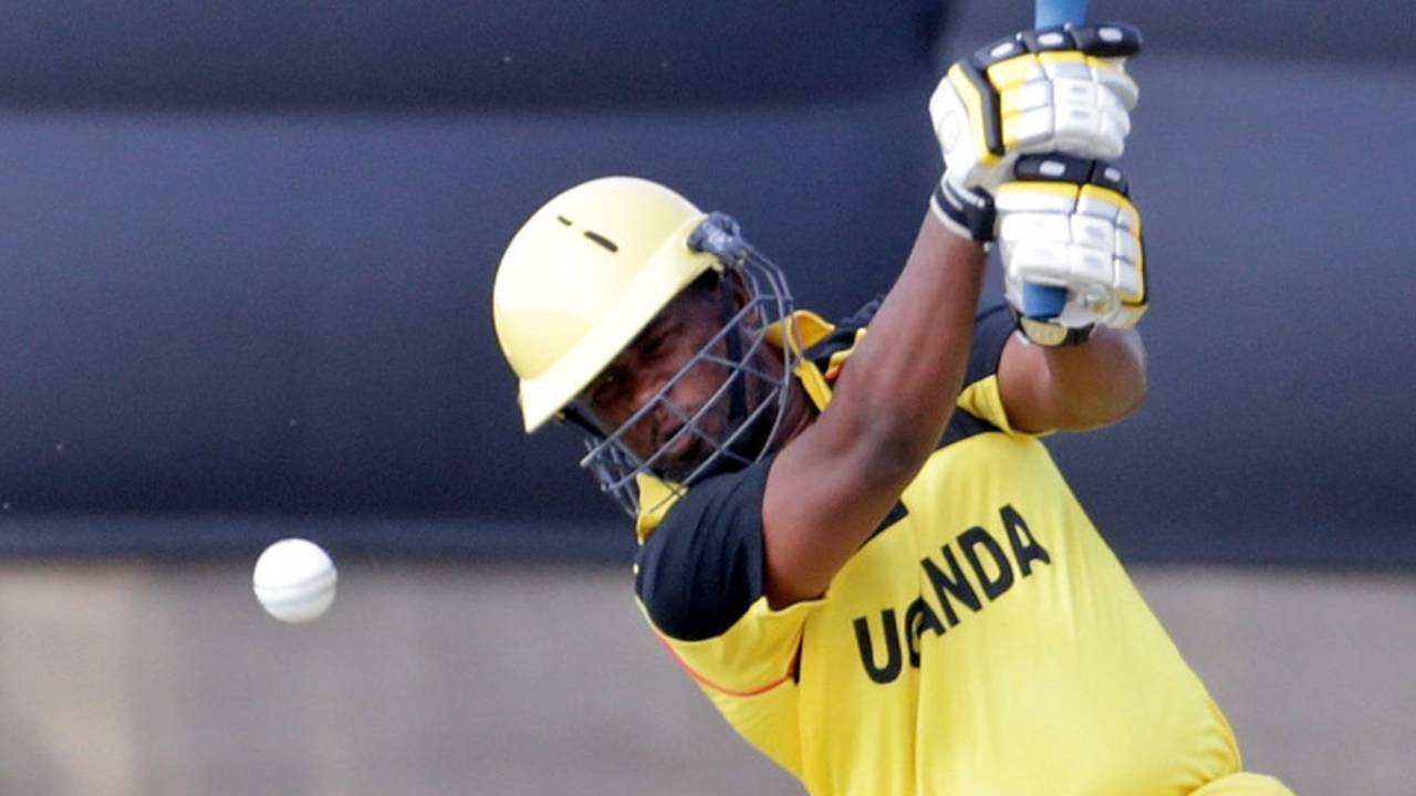 Hamza Saleh hits down the ground, Hong Kong v Uganda, ICC World Twenty20 Qualifier, Group A, Abu Dhabi, November 16, 2013
