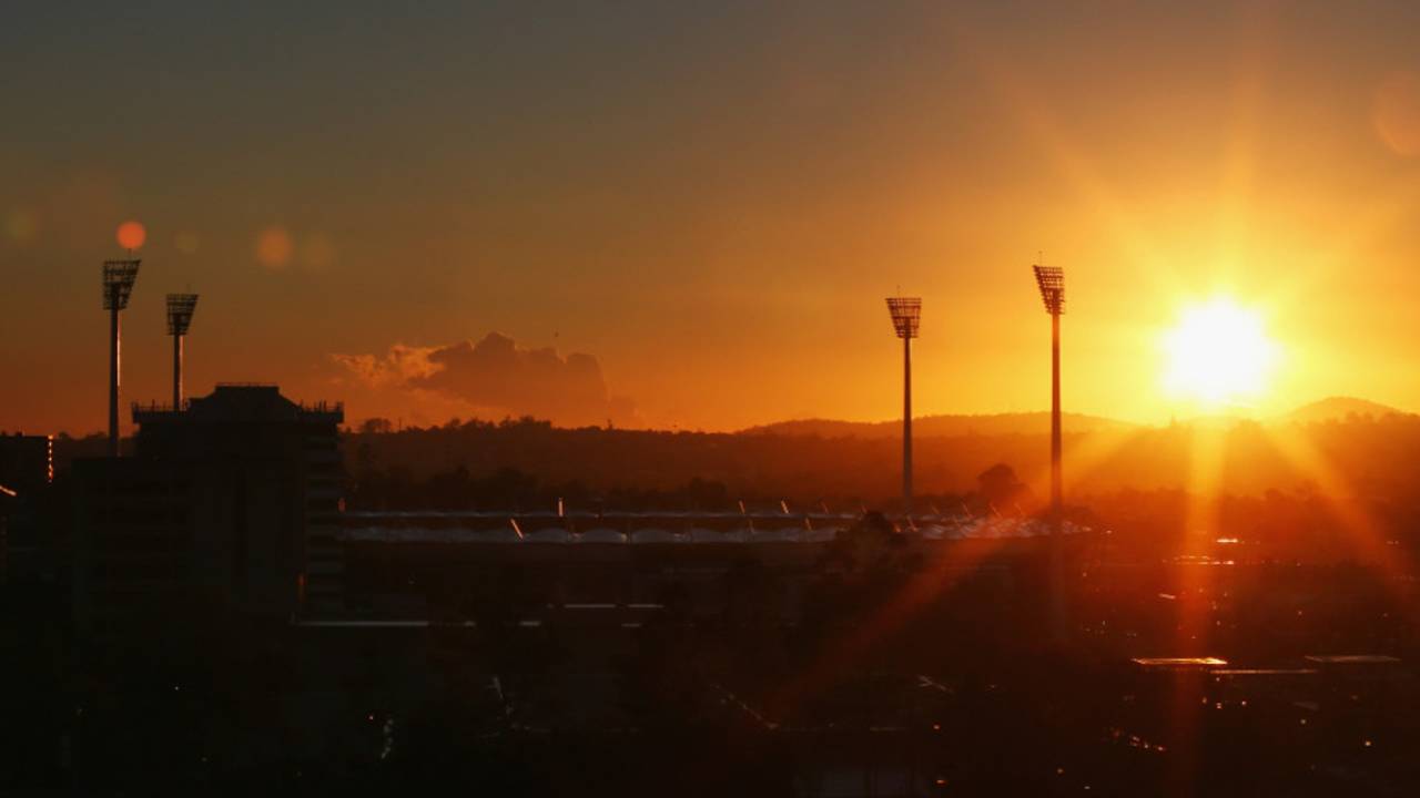 The sun rises over the Gabba, Brisbane, November 19, 2013