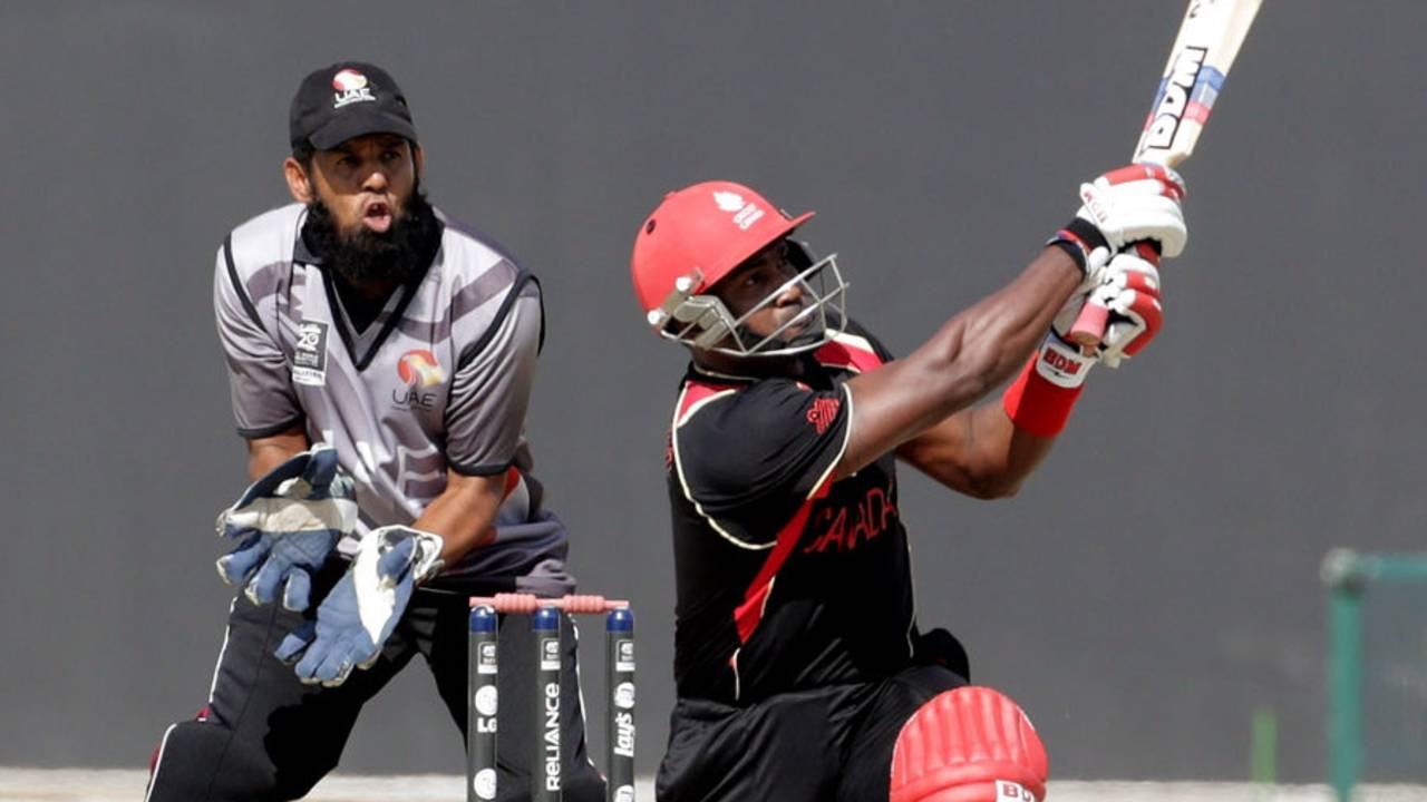 Damodar Daesrath slogs the ball during his 21-ball 30, United Arab Emirates v Canada, World Twenty20 Qualifiers, Group A, Abu Dhabi, November 22, 2013