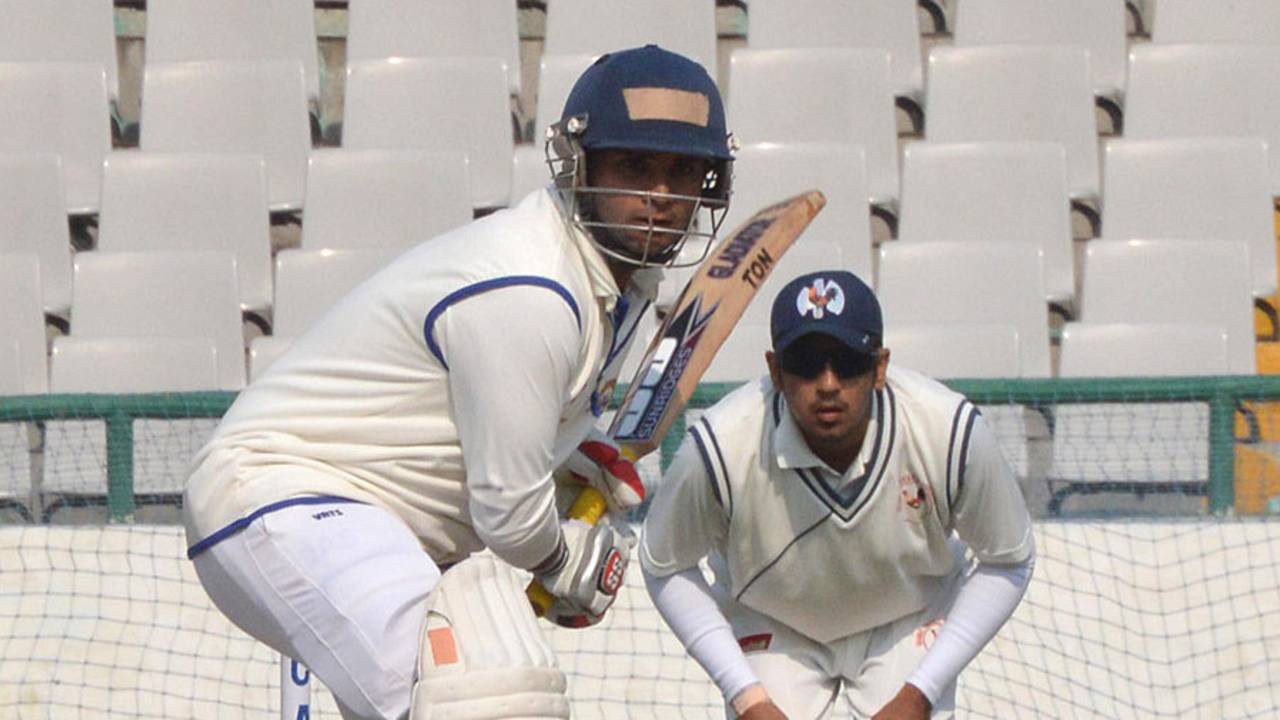 Punjab's Ravi Inder Singh shapes to drive, Punjab v Gujarat, Ranji Trophy, Group A, Mohali, 2nd day, November 22, 2013