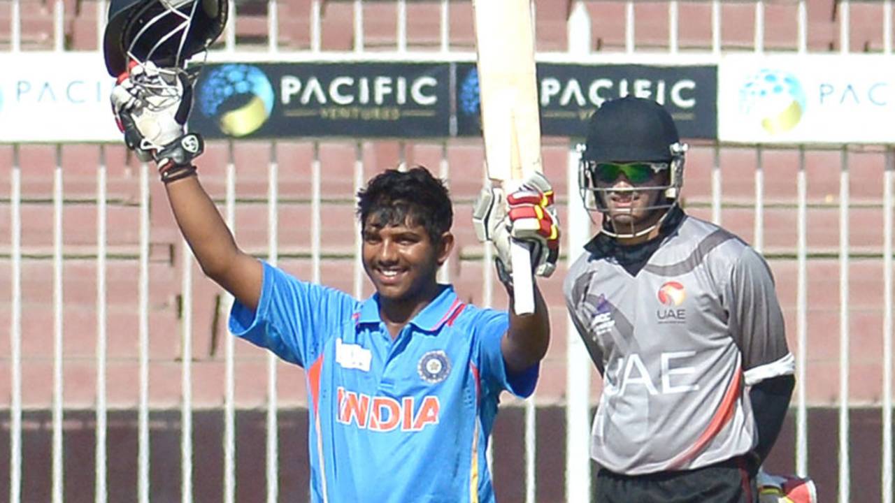 Akhil Herwadkar raises his bat after scoring a century, United Arab Emirates Under-19s v India Under-19s, Under-19 Asia Cup, Sharjah, December 28, 2013 