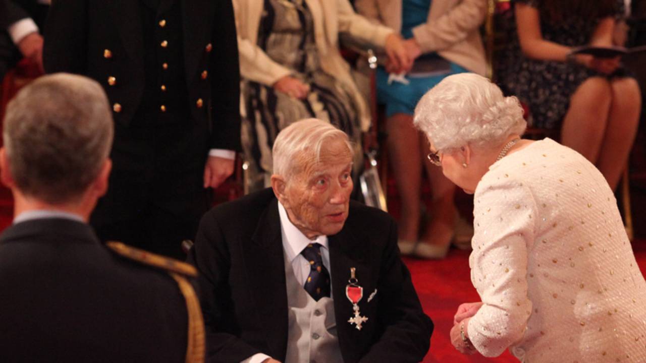 Former cricketer George Chesterton receives his MBE from the Queen, London, October 19, 2012