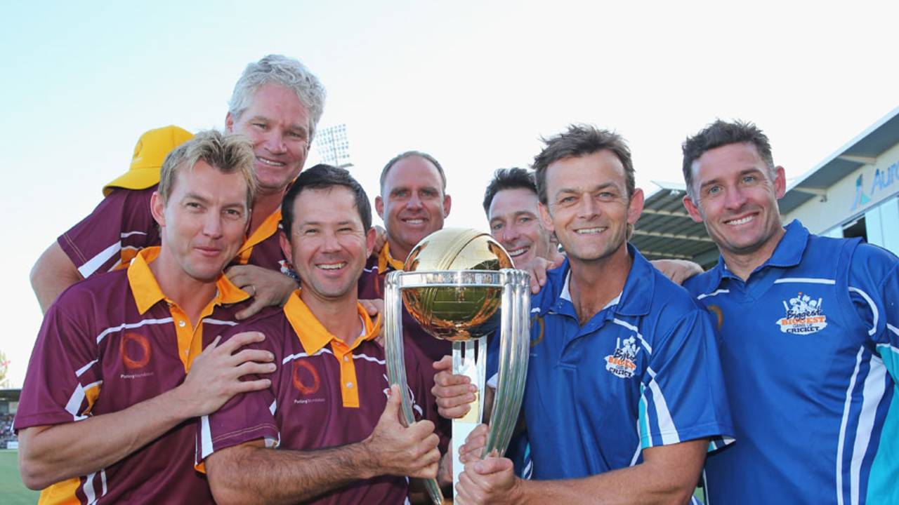 Australia's former World Cup winners pose with the trophy during the Ricky Ponting Tribute Match