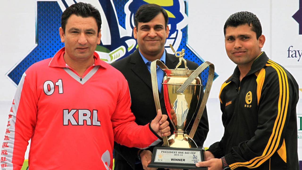 KRL captain Saeed Anwar jnr, PCB CEO Subhan Ahmed and Kamran Akmal with the President's Cup Trophy, Khan Research Laboratories v National Bank of Pakistan, one-day final, Lahore, February 1, 2014