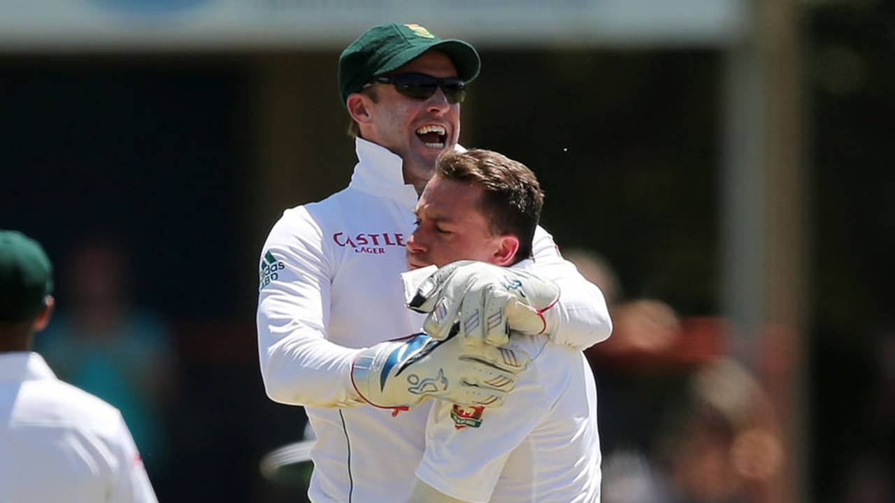 AB de Villiers celebrates with Dale Steyn after Michael Clarke's wicket, South Africa v Australia, 1st Test, Centurion, 1st day, February 12, 2014