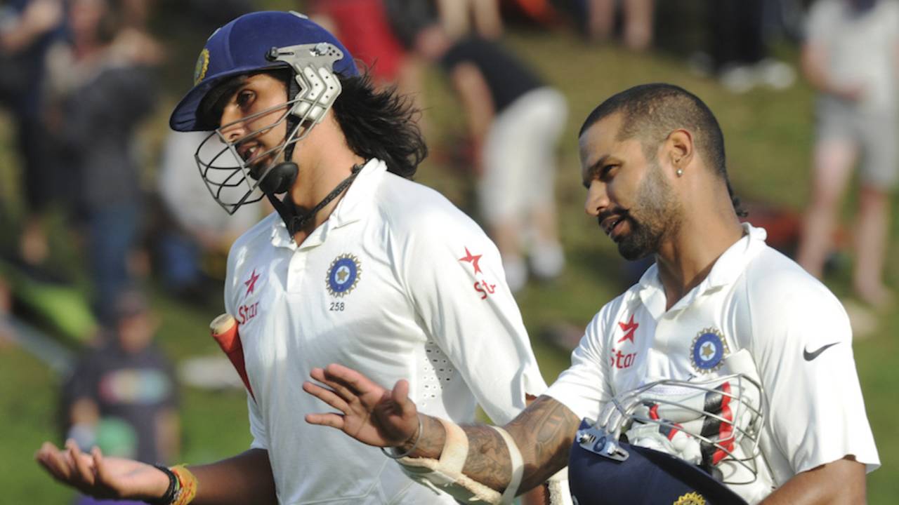 Ishant Sharma and Shikhar Dhawan walk back at the close of play, New Zealand v India, 2nd Test, Wellington, February 14, 2014