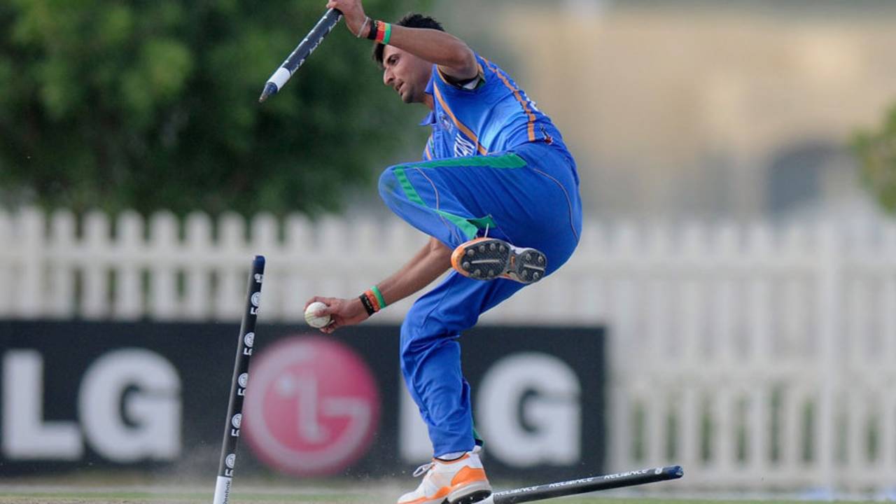 Afghanistan Under-19's Abdullah Adil make absolutely sure of a run-out, Afghanistan v Australia, Under-19 World Cup, Abu Dhabi, February 17, 2014