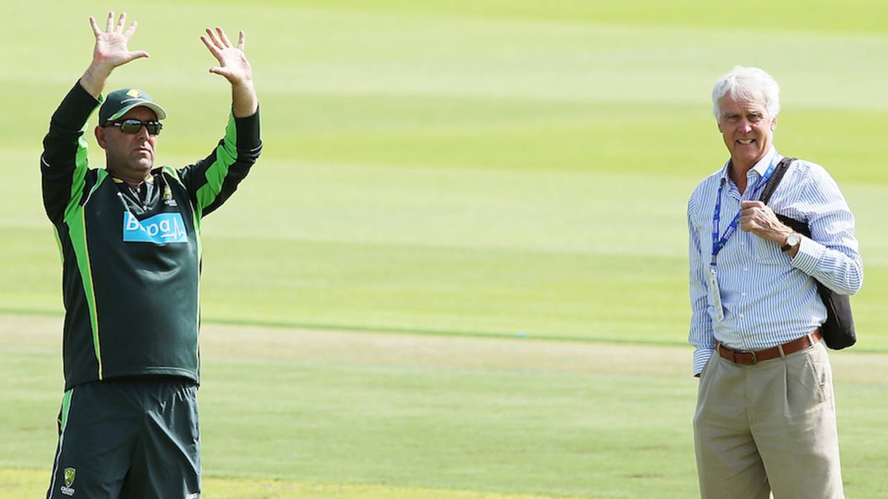 10 minutes to training: Darren Lehmann, with John Inverarity, signals to the team, Port Elizabeth, February 18, 2014