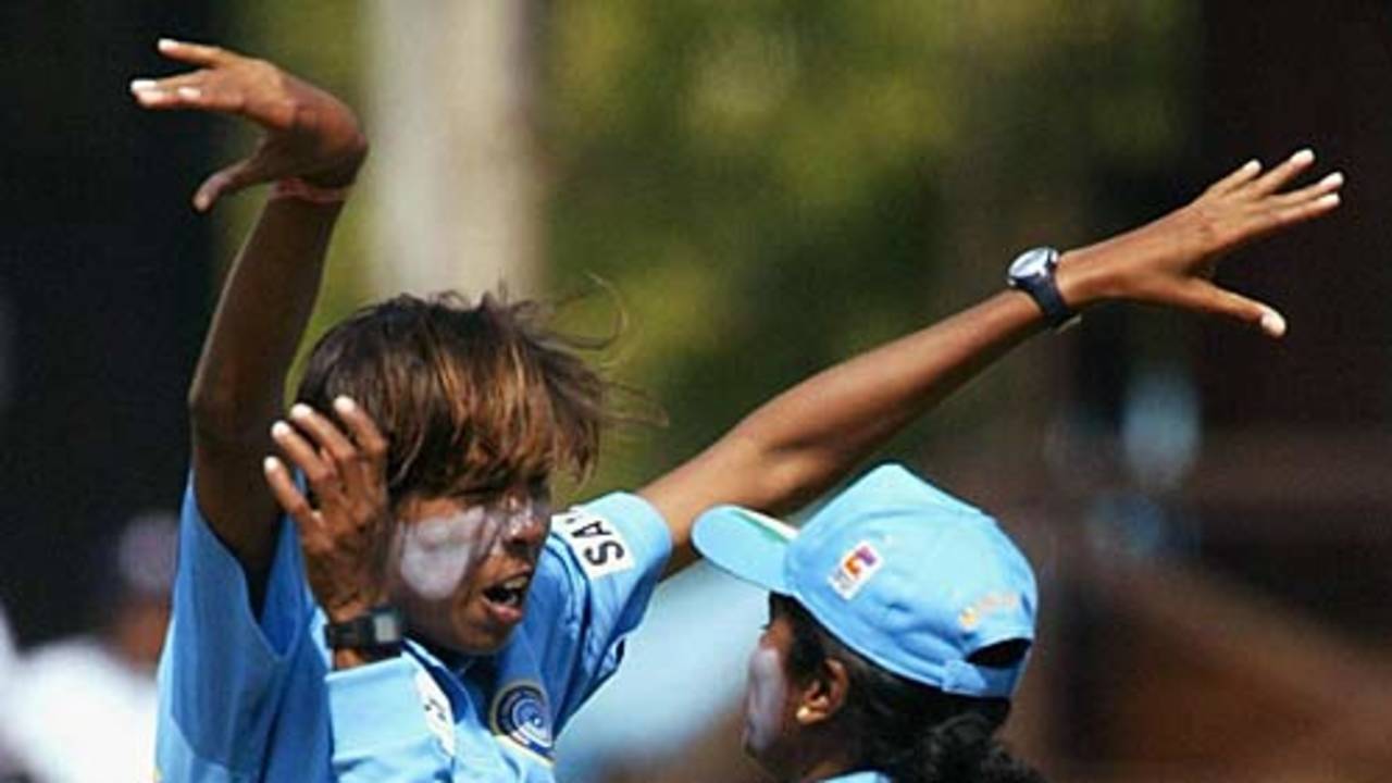Jhulan Goswami is congratulated by Deepa Marathe