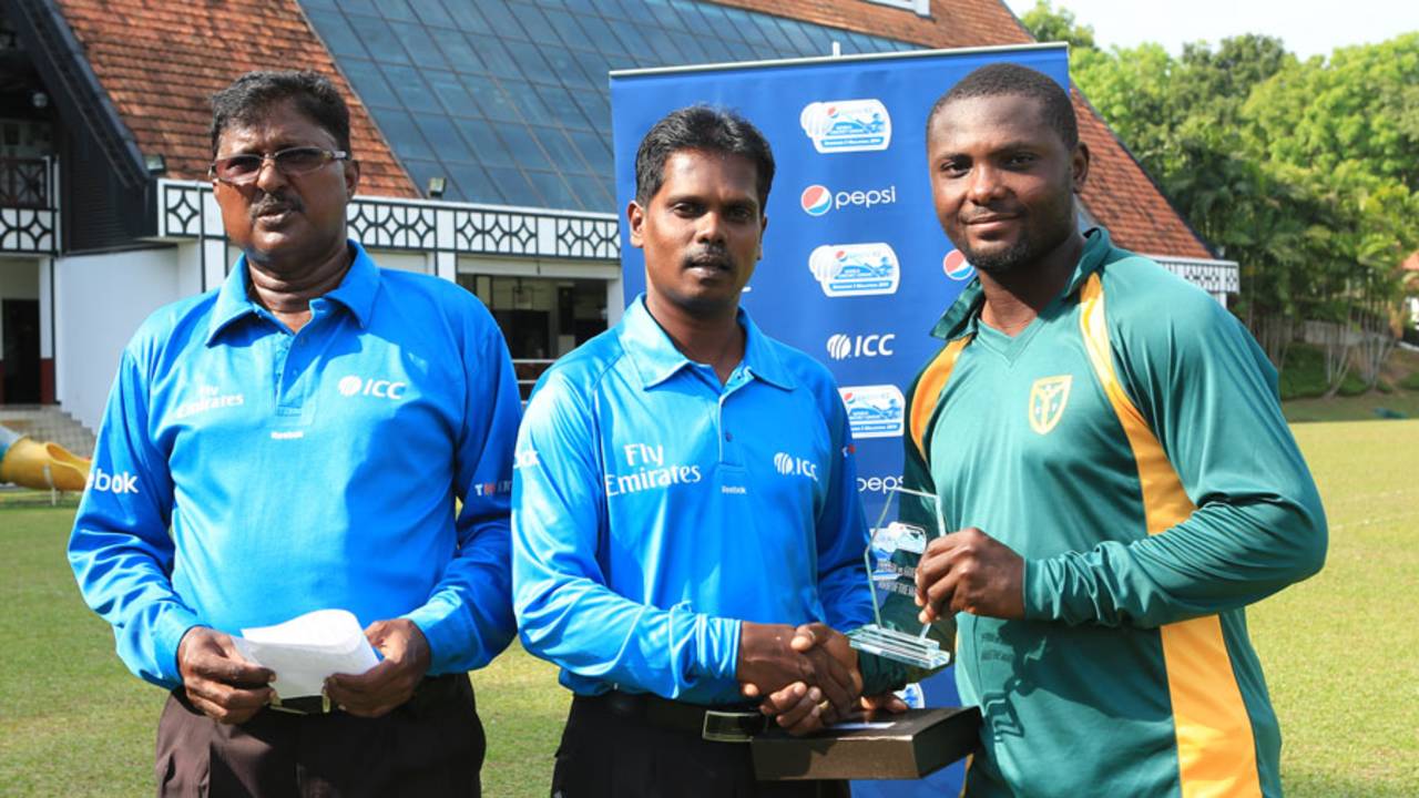 Endurance Ofem receives the Man-of-the-Match award, Nigeria v Guernsey, ICC World Cricket League Division Five, Kuala Lumpur, March 7, 2014