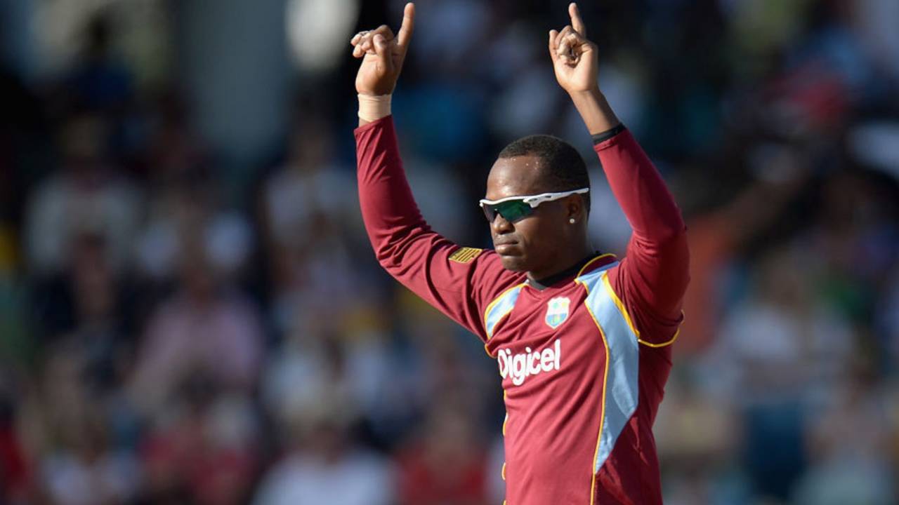 Marlon Samuels followed up his runs with key wickets, West Indies v England, 1st T20, Barbados, March 9, 2014