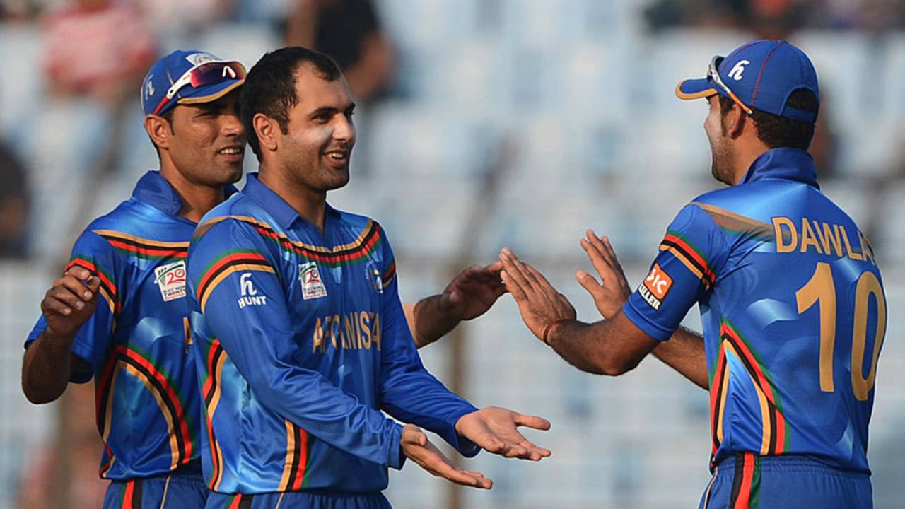 Mohammad Nabi celebrates a wicket with his team-mates, Afghanistan v Hong Kong, World T20, Group A, Chittagong, March 18, 2014