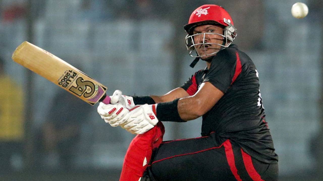 Munir Dar plays the sweep, Bangladesh v Hong Kong, World T20, Group A, Chittagong, March 20, 2014