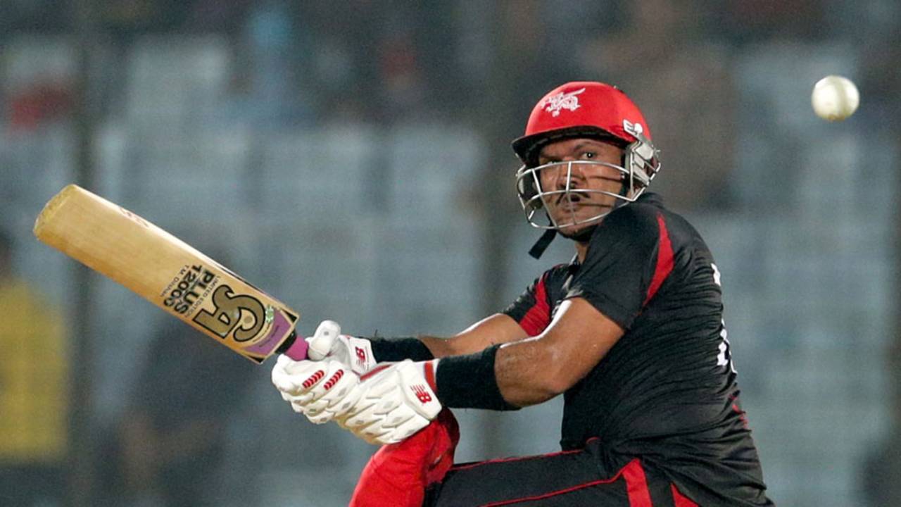 Munir Dar plays the sweep, Bangladesh v Hong Kong, World T20, Group A, Chittagong, March 20, 2014