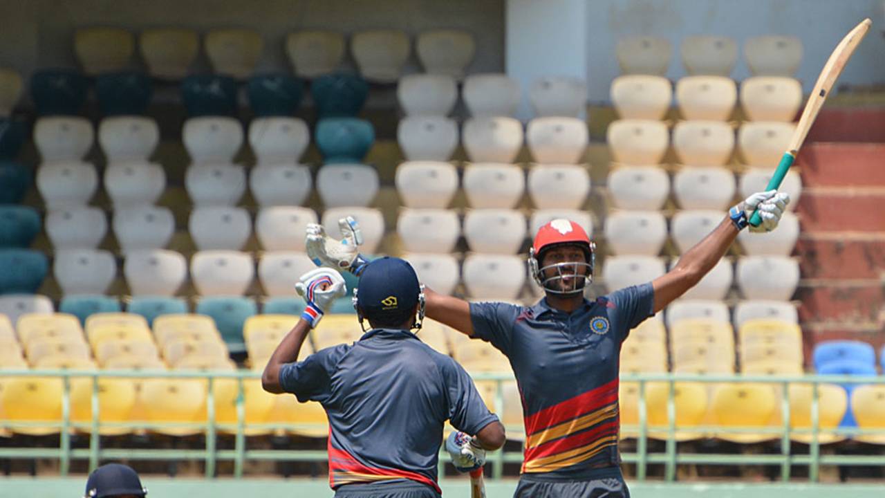 Goa's Amit Yadav celebrates after hitting a six of the last ball to seal a thriller