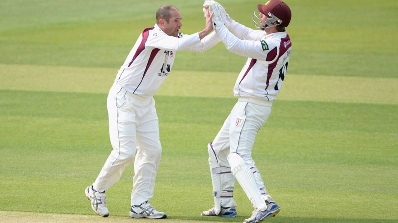 Andrew Hall celebrates a wicket with David Murphy, Yorkshire v Northamptonshire, County Championship, Division One, Headingley, 1st day, April 20, 2014