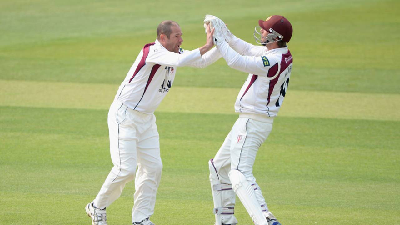 Andrew Hall celebrates a wicket with David Murphy