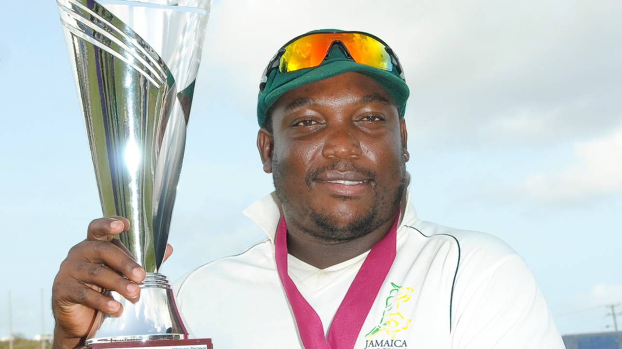 Jamaica captain Tamar Lambert shows off the Headley-Weekes Trophy, Windward Islands v Jamaica, Regional Four Day Competition, final, St Lucia, 4th day, April 29, 2014