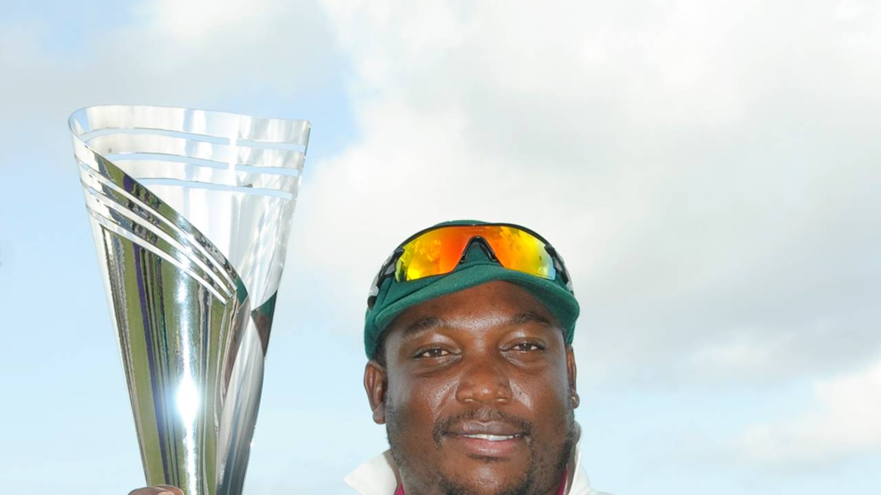 Jamaica captain Tamar Lambert shows off the Headley-Weekes Trophy, Windward Islands v Jamaica, Regional Four Day Competition, final, St Lucia, 4th day, April 29, 2014