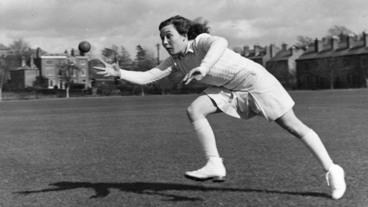 Hazel Sanders catches a ball during practice, May 5, 1951