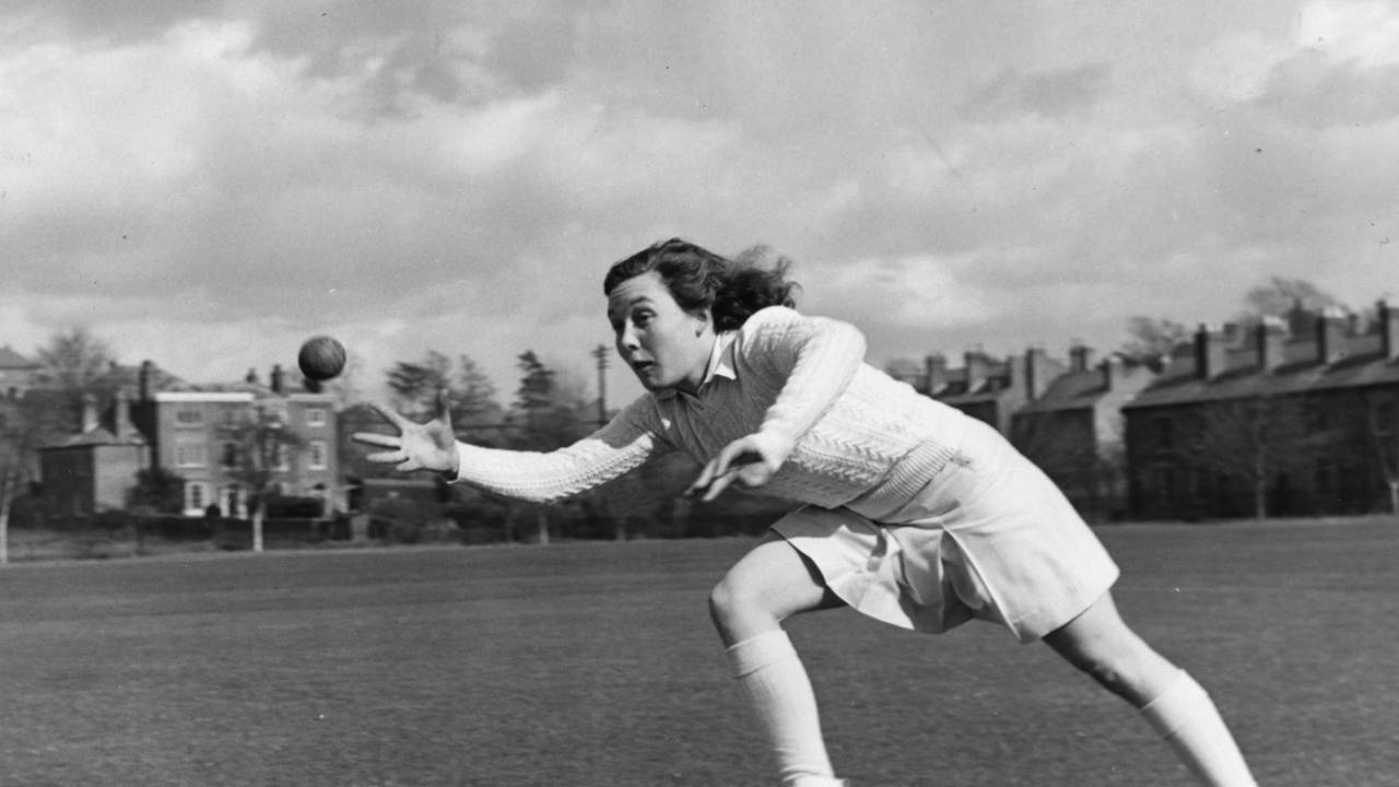 Hazel Sanders catches a ball during practice, May 5, 1951