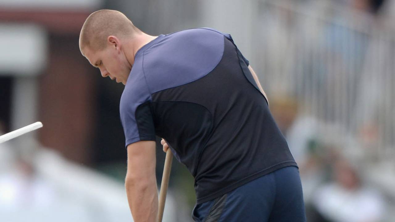 A member of the MCC ground staff sweeps the pitch, England v India, 2nd Investec Test, Lord's, 3rd day, July 19, 2014