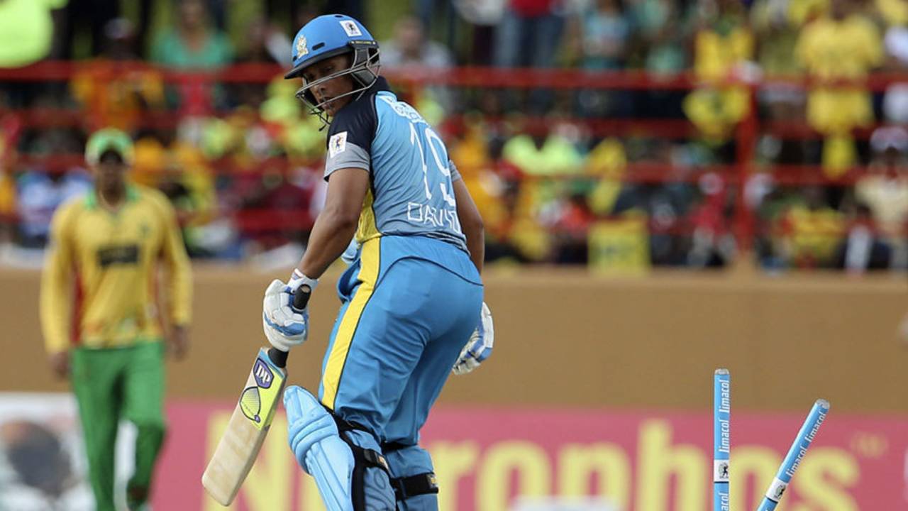 Henry David's stumps were uprooted by Krishmar Santokie, Guyana Amazon Warriors v St Lucia Zouks, CPL 2014, Providence, July 19, 2014