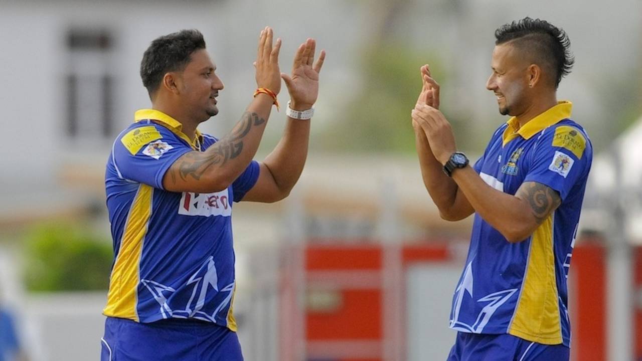 Ravi Rampaul celebrates the wicket of Sheldon Cottrell, Barbados Tridents  v Antigua Hawksbills, CPL 2014, Bridgetown, July 25, 2014