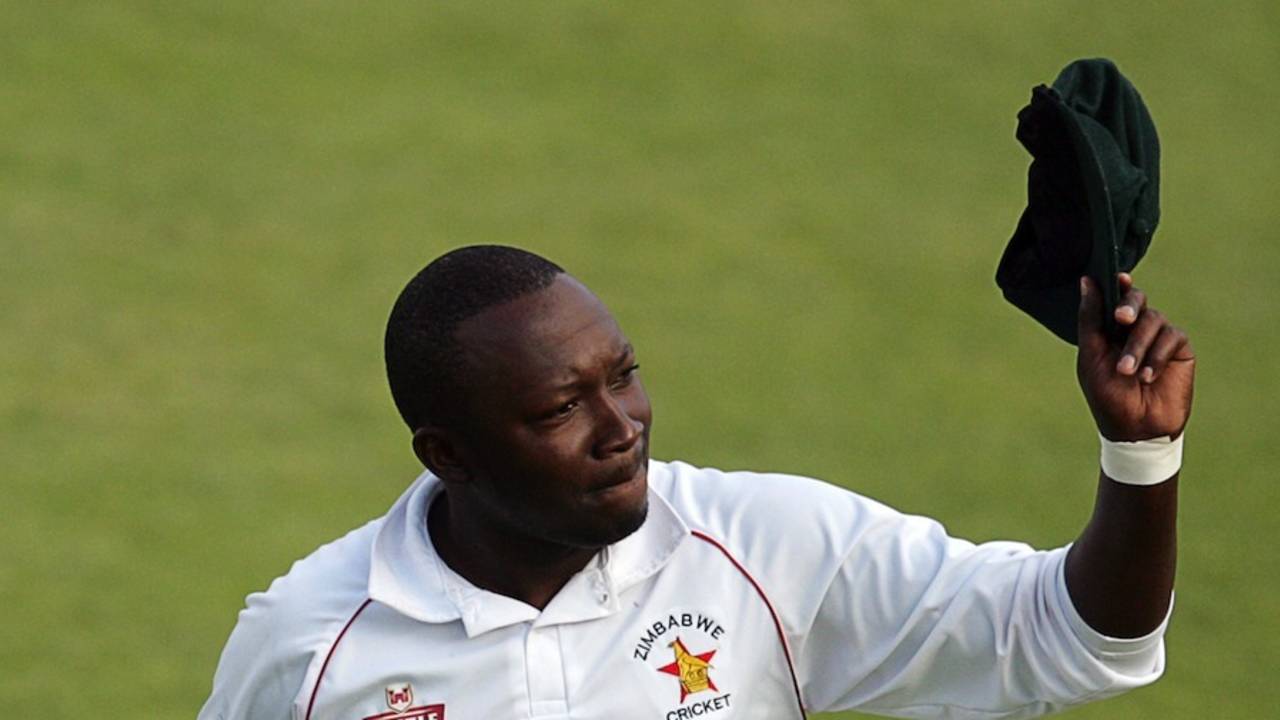 John Nyumbu acknowledges cheers from the crowd, Zimbabwe v South Africa, only Test, Harare, 3rd day, August 11, 2014
