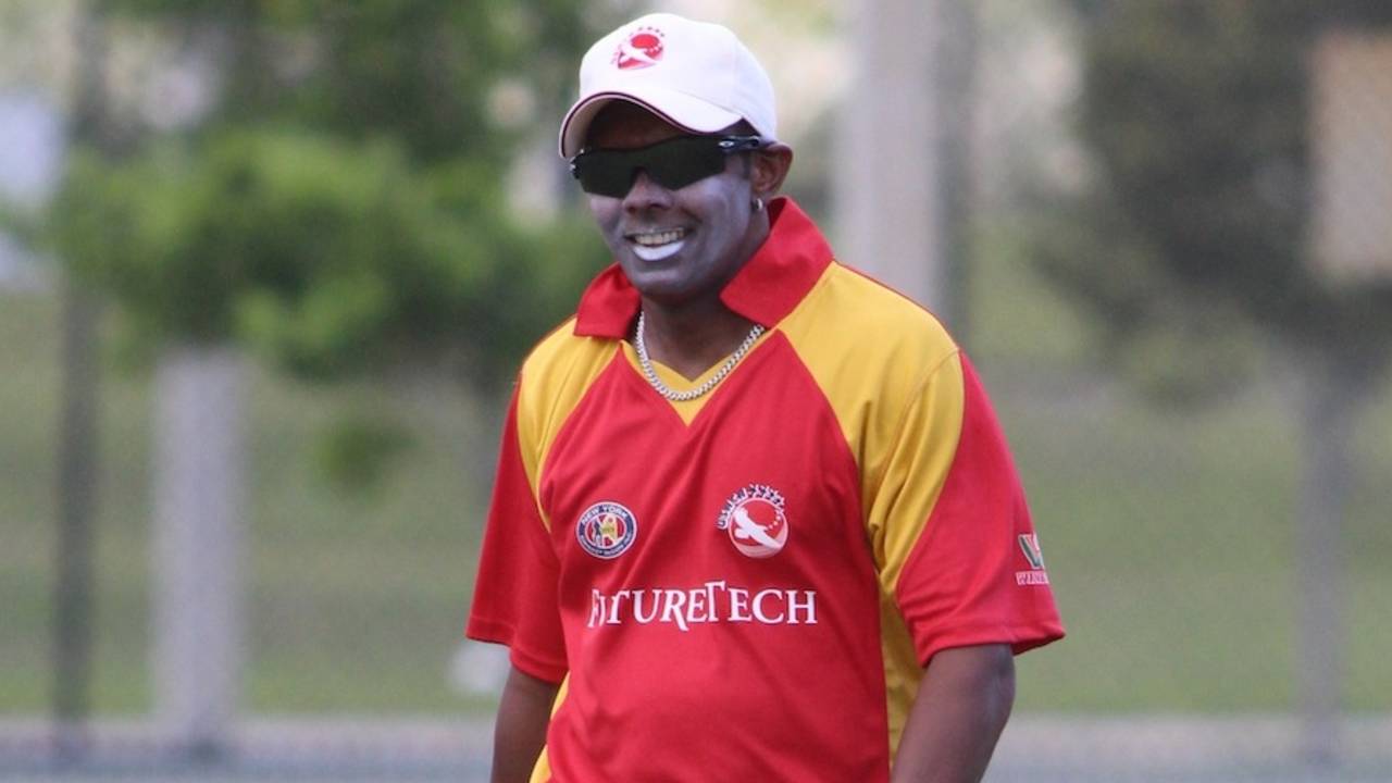 Steve Massiah strolls back to his fielding position, North East Region v New York Region, USACA T20 National Championship, Lauderhill, August 14, 2014