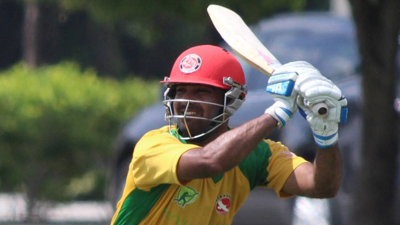 Ritesh Kadu drives through the off side, South West v North East, USACA T20 National Championship, Florida, August 15, 2014