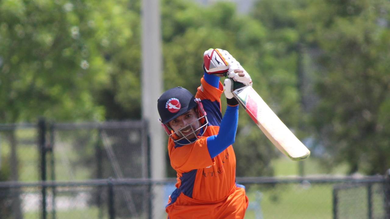 Aditya Mishra punches through the off side, Central West v North East, USACA T20 National Championship, Lauderhill, August 16, 2014