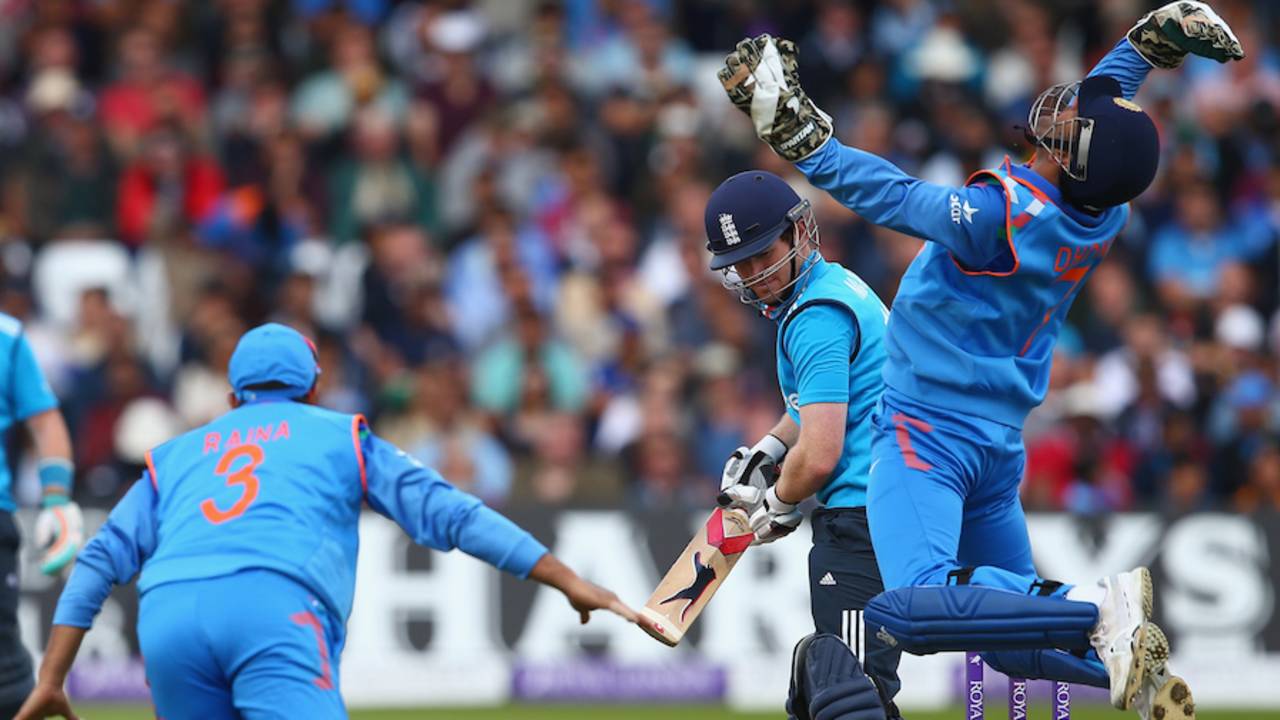 MS Dhoni leaps in the air after taking an edge off Eoin Morgan's bat, England v India, 3rd ODI, Trent Bridge, August 30, 2014