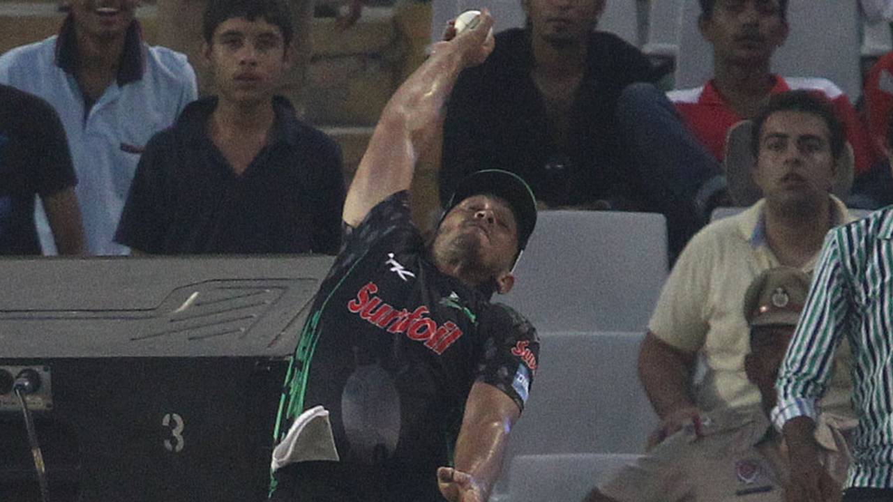 Vaughn van Jaarsveld leaps to try take a catch at the boundary, Dolphins v Perth Scorchers, Champions League T20, Mohali, September 20, 2014