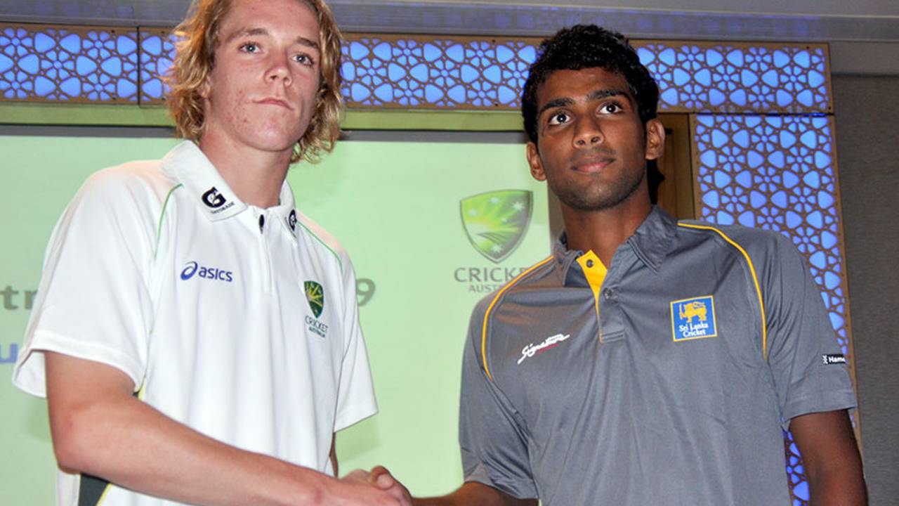 Patrick McKenna and Chamika Karunaratne, the captains of the Australia and Sri Lanka U-19 teams, shake hands, Colombo, September 24, 2014