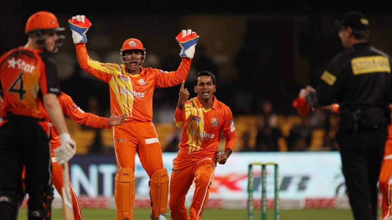Mohammad Hafeez is in disbelief as umpire Rod Tucker turns him down, Lahore Lions v Perth Scorchers, Champions League T20, Group A, Bangalore, September 30, 2014