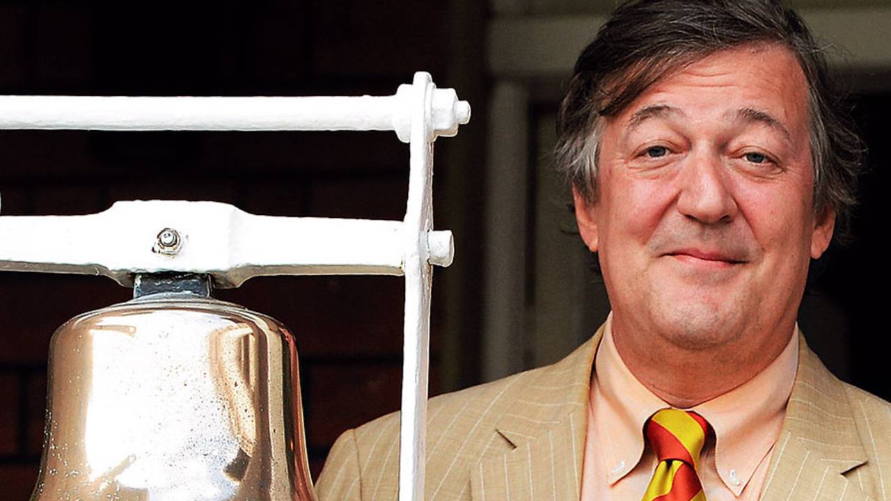 British actor Stephen Fry rings the five-minute bell ahead of the second day's play, England v India, 2nd Investec Test, Lord's, 2nd day, July 18, 2014