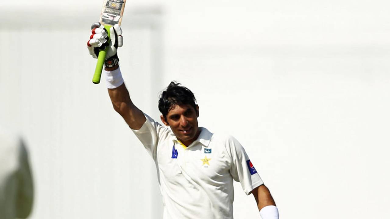 Misbah-ul-Haq raises his bat after a record Test century, Pakistan v Australia, 2nd Test, Abu Dhabi, 4th day, November 2, 2014